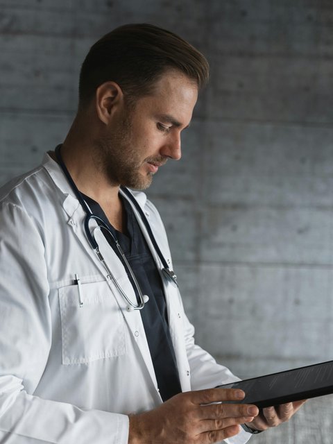 Physician reviewing chart